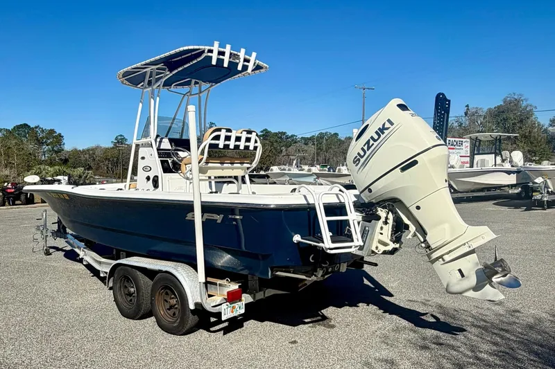 Slide: The Image of 2018 Epic 24 Bay Center Console boat with Suzuki outboard motor on trailer. - 7