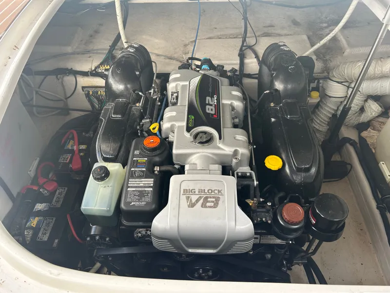 Slide: The Image of Engine compartment of a 2013 Rinker 290 Express Cruiser with V8 engine. - 11