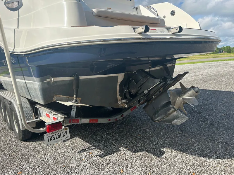 Slide: The Image of 2013 Rinker 290 Express Cruiser on trailer, rear view. - 3