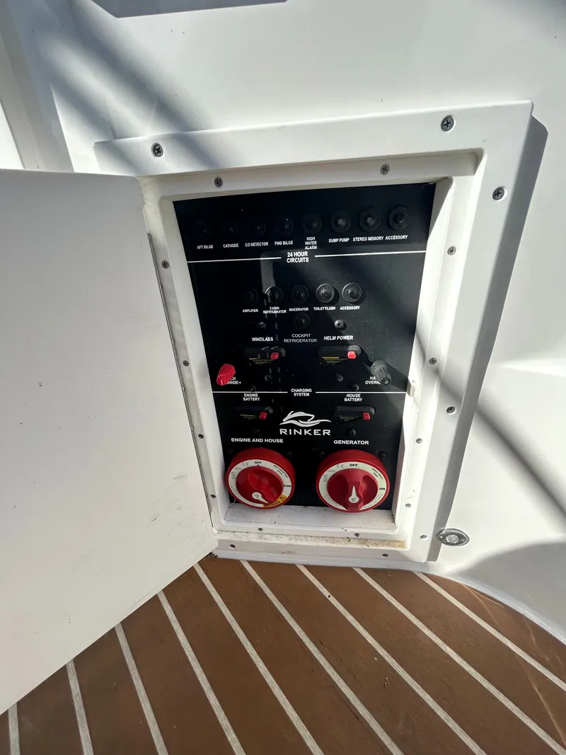 Slide: The Image of Rinker 290 Express Cruiser 2013 control panel inside boat. - 34
