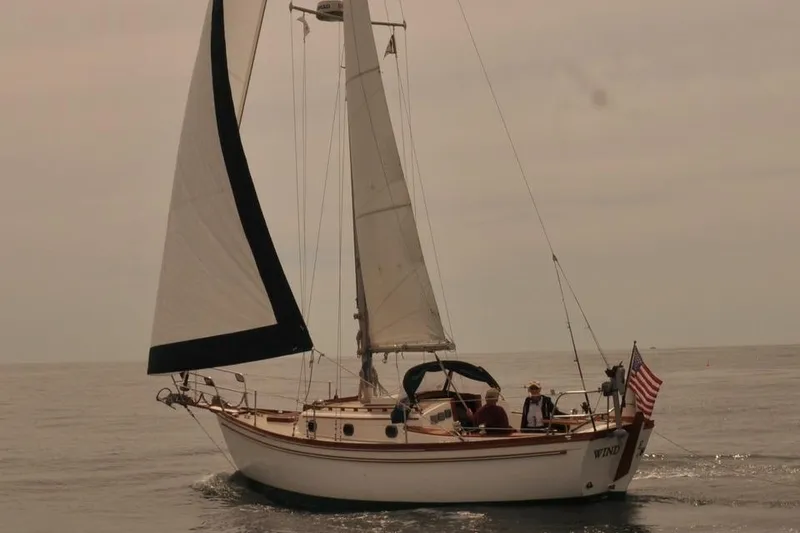The Image of 1980 Shannon 28 sailboat on calm waters. - 0