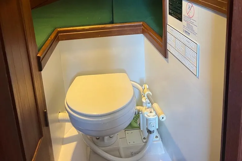Slide: The Image of Marine toilet in a 1980 Shannon 28 yacht. - 13