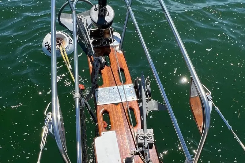 Slide: The Image of Bow of a 1980 Shannon 28 sailboat on the water. - 18