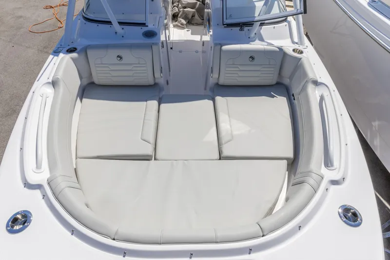 Slide: The Image of Luxurious seating area on the 2026 Edgewater 248CX Crossover boat. - 17