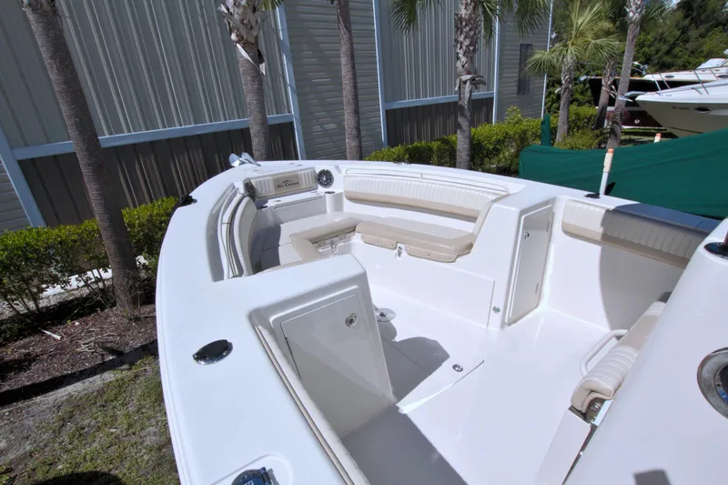 Slide: The Image of 2018 Sea Chaser 27 HFC boat interior with seating and storage compartments. - 23