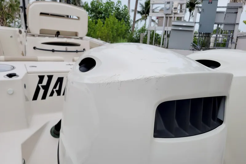 Slide: The Image of 2018 Sea Chaser 27 HFC boat with visible engine cover damage. - 44