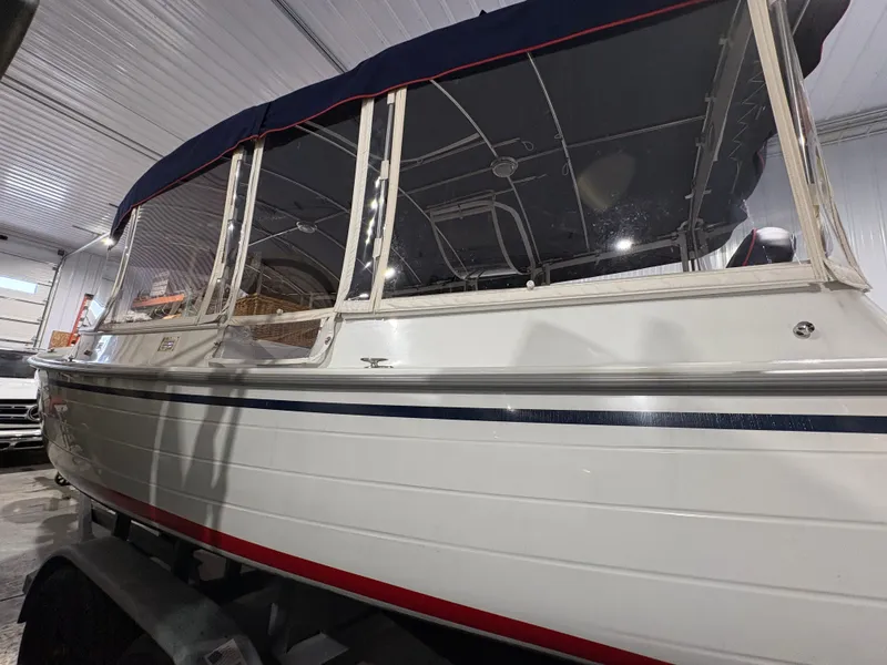 Slide: The Image of 2021 Duffy Cuddy Cabin boat in a storage facility. - 22
