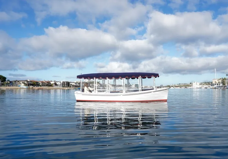 Slide: The Image of 2021 Duffy Cuddy Cabin boat covered in storage facility. - 3