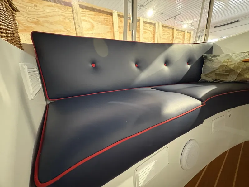 Slide: The Image of Interior of 2021 Duffy Cuddy Cabin with blue upholstery. - 36