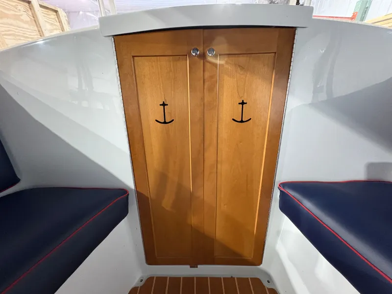 Slide: The Image of Interior of a 2021 Duffy Cuddy Cabin with wooden doors. - 42