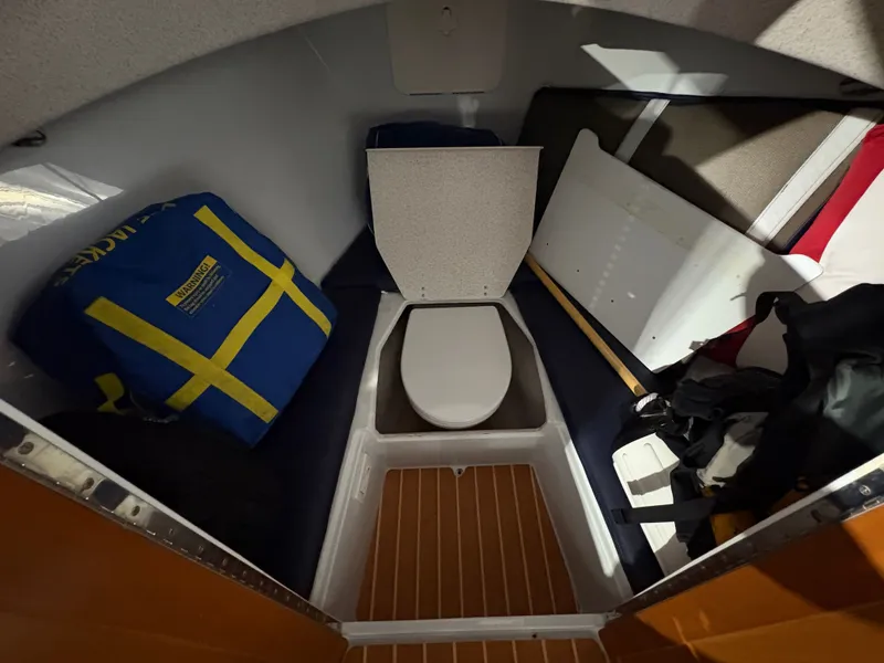Slide: The Image of Interior of a 2021 Duffy Cuddy Cabin with toilet and gear. - 44