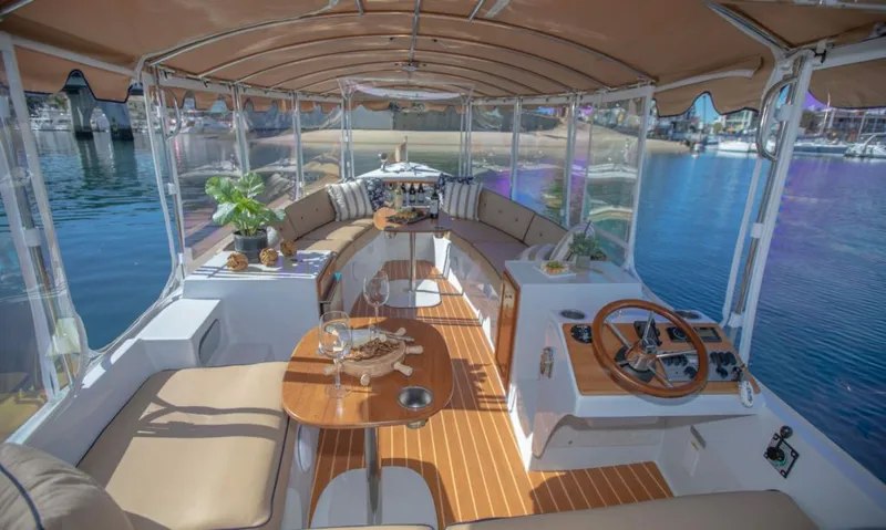 Slide: The Image of 2021 Duffy Cuddy Cabin boat covered in storage facility. - 5