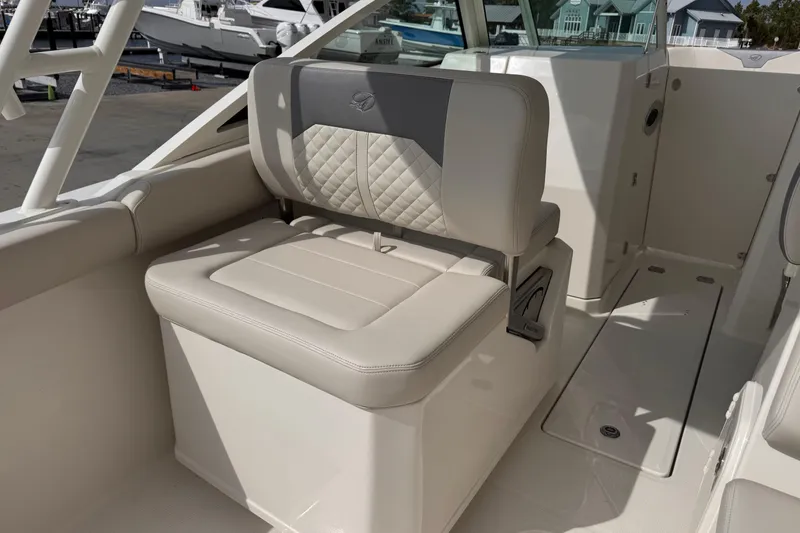 Slide: The Image of Luxurious seating on 2026 Sailfish 276 DC boat, featuring elegant upholstery and modern design. - 13
