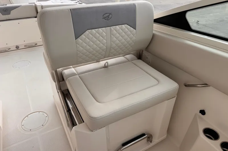 Slide: The Image of 2026 Sailfish 276 DC boat seat with quilted upholstery and storage compartment. - 18