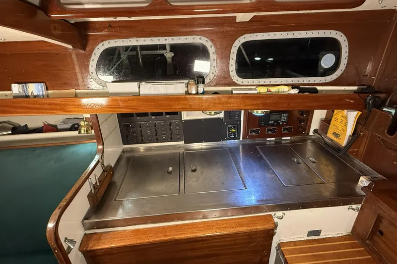 Slide: The Image of Interior of 1959 Sparkman & Stephens Custom 46 yacht with wooden cabinetry and control panels. - 16