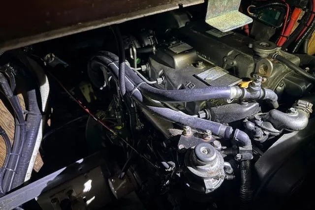 Slide: The Image of Engine compartment of a 1959 Sparkman & Stephens Custom 46 sailboat, showcasing mechanical components. - 22