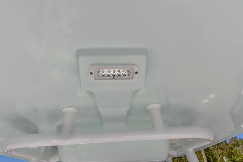 Slide: The Image of LED light fixture on 2022 Crevalle 24 HCO boat's underside, showcasing modern design. - 21