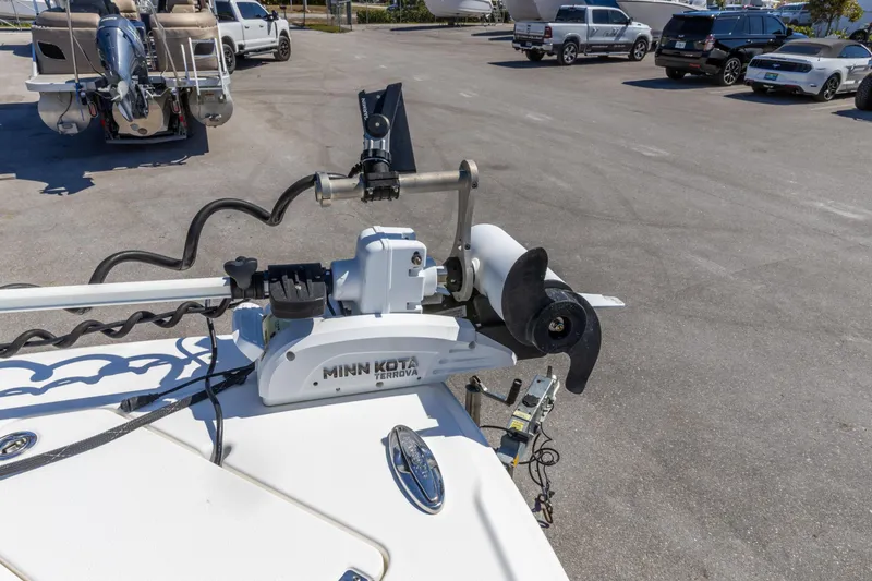 Slide: The Image of 2022 Crevalle 24 HCO boat with Minn Kota Terrova trolling motor in parking lot. - 3