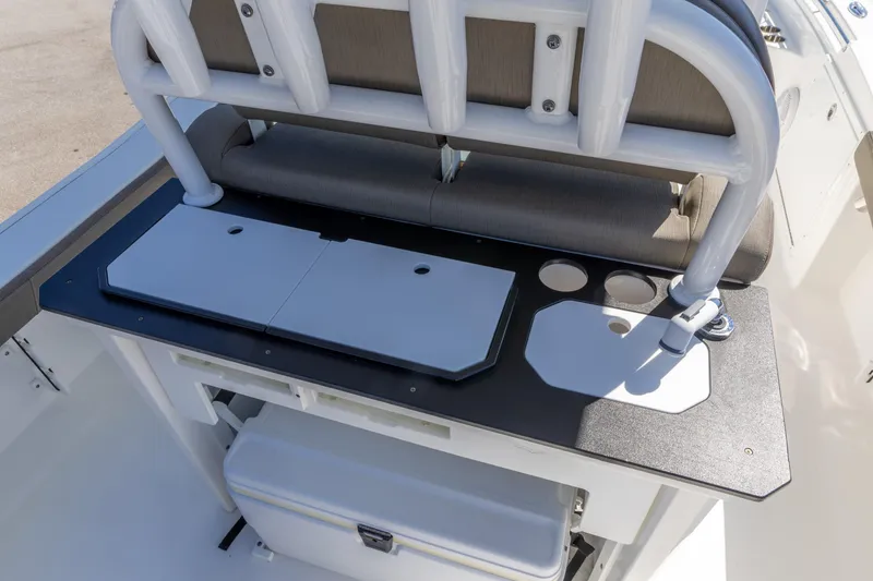 Slide: The Image of 2022 Crevalle 24 HCO boat interior with seating and storage compartments. - 5