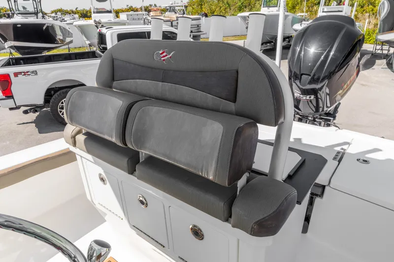 Slide: The Image of 2022 Crevalle 24 HCO boat seat with storage and Yamaha 250 engine. - 7