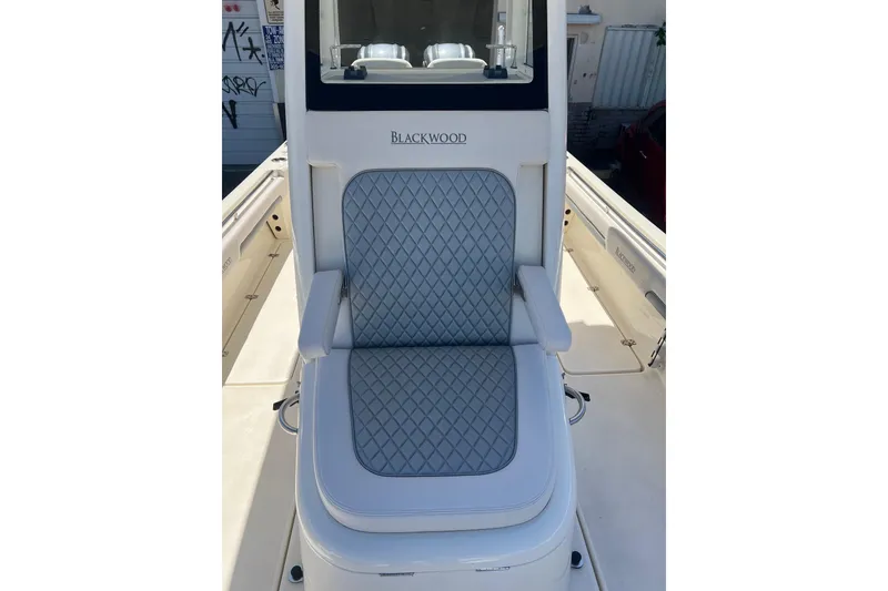 Slide: The Image of Luxury seating on 2026 Blackwood 270 boat, featuring diamond-stitched upholstery. - 10
