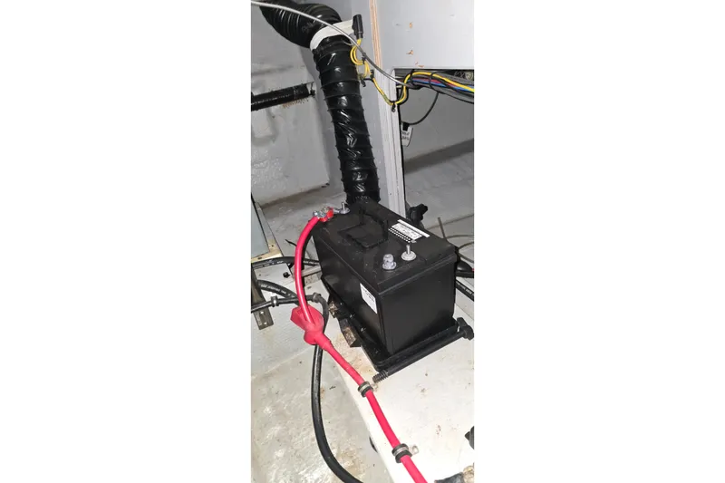 Slide: The Image of Battery setup in 1998 Silverton 322 Motor Yacht engine compartment. - 58