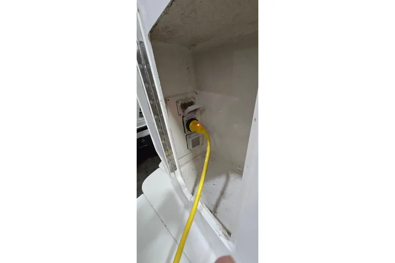 Slide: The Image of Yellow power cable connected to 1998 Silverton 322 Motor Yacht. - 60