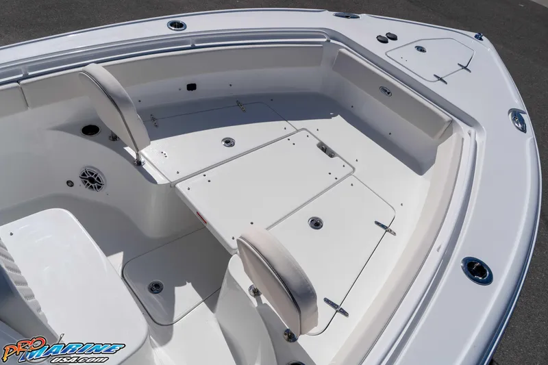 Slide: The Image of 2026 Sea Hunt Ultra 265 SE boat interior with seating and storage compartments. - 24