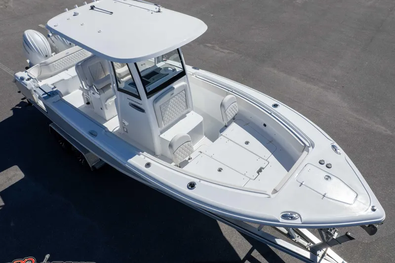 Slide: The Image of 2026 Sea Hunt Ultra 265 SE boat, aerial view, sleek design, spacious deck. - 30
