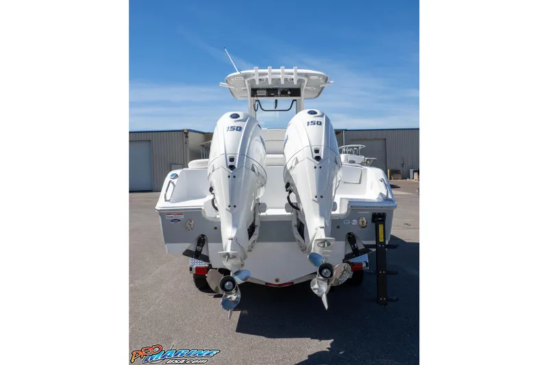 Slide: The Image of 2026 Sea Hunt Ultra 265 SE boat with dual outboard motors, rear view. - 40