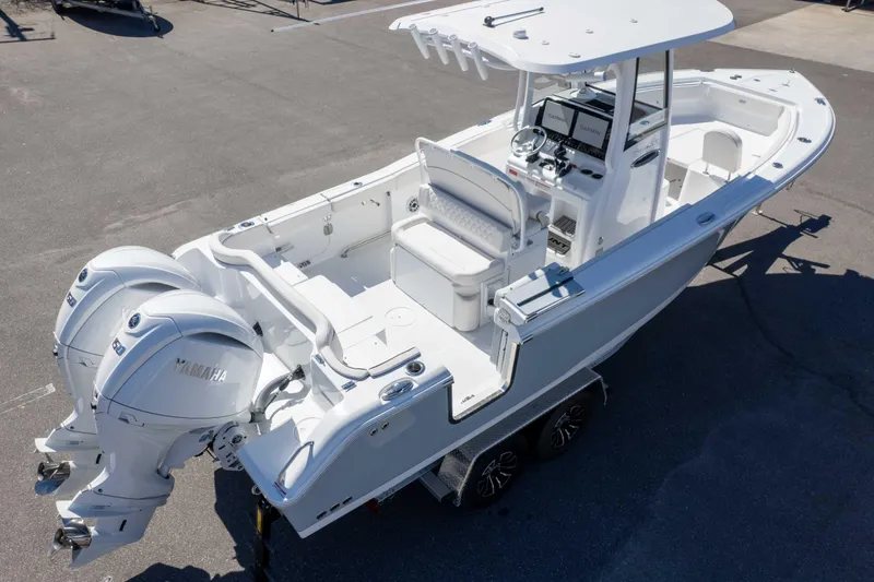Slide: The Image of 2026 Sea Hunt Ultra 265 SE boat with dual Yamaha engines, aerial view. - 44