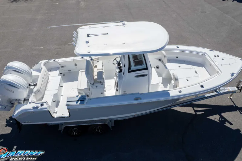 Slide: The Image of 2026 Sea Hunt Ultra 265 SE boat with dual engines, aerial view. - 46