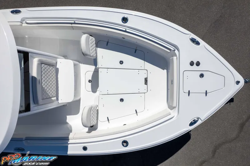 Slide: The Image of 2026 Sea Hunt Ultra 265 SE boat, aerial view of bow seating and storage compartments. - 47