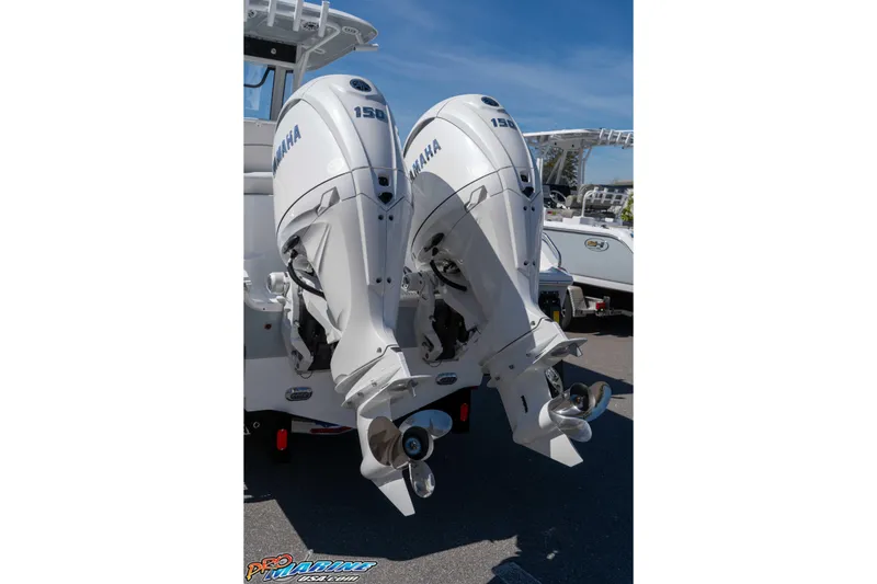 Slide: The Image of Twin Yamaha outboard engines on a 2026 Sea Hunt Ultra 265 SE boat. - 7