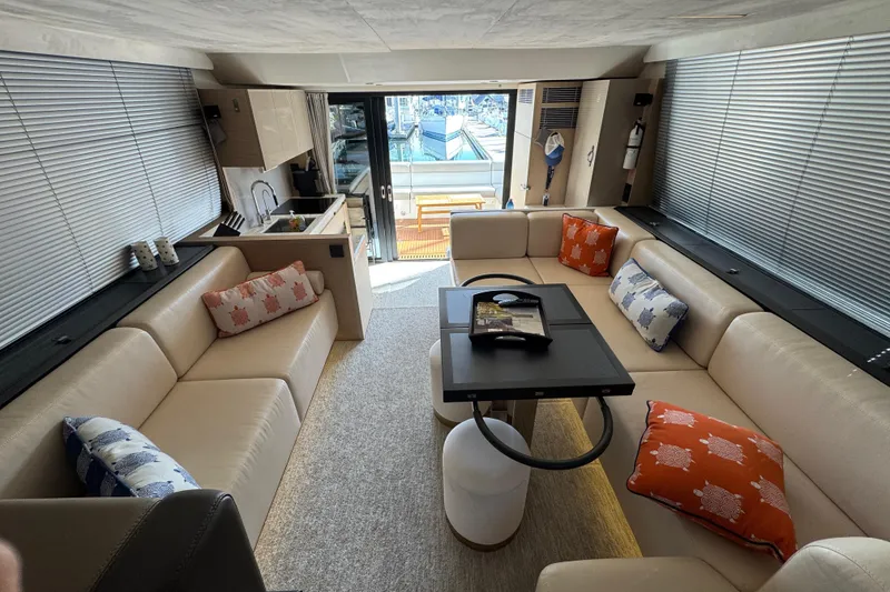 Slide: The Image of Luxurious interior of 2020 Beneteau Monte Carlo 52 yacht with elegant seating and decor. - 17
