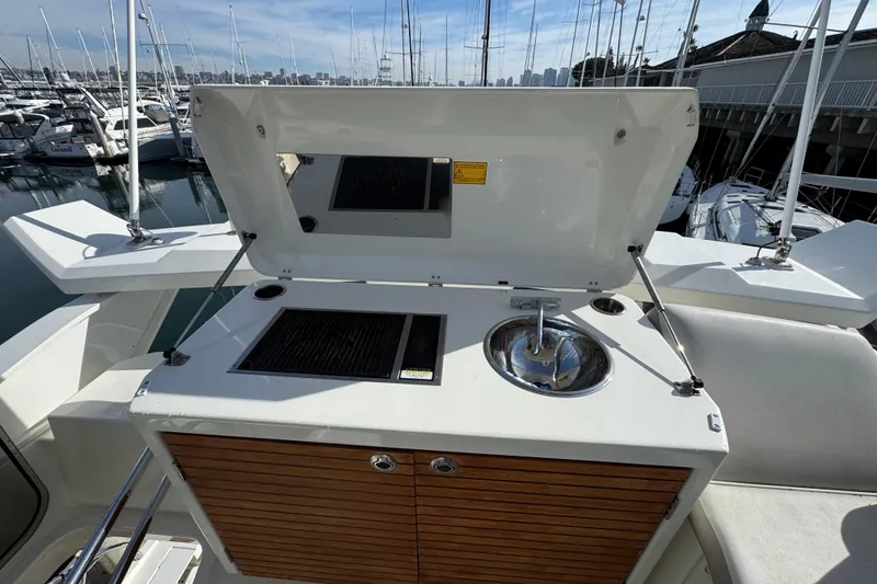 Slide: The Image of Outdoor kitchen on 2020 Beneteau Monte Carlo 52 yacht with grill and sink. - 50