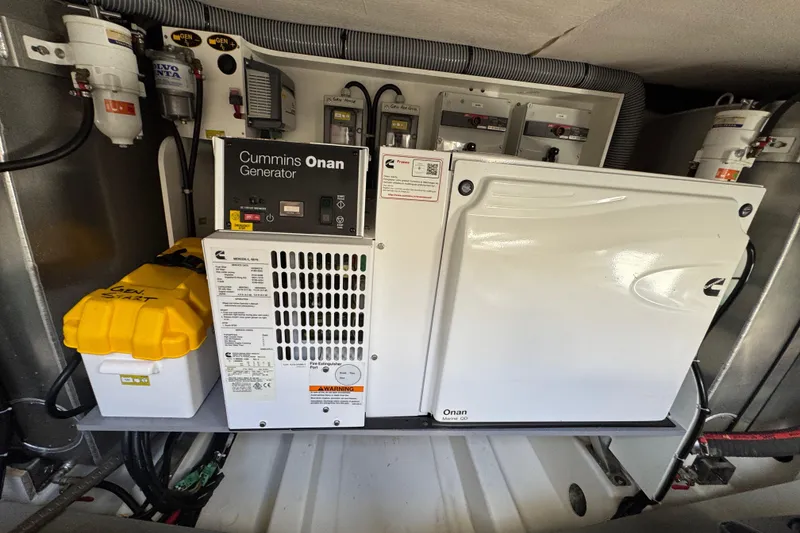 Slide: The Image of Cummins Onan generator in 2020 Beneteau Monte Carlo 52 yacht engine room. - 57