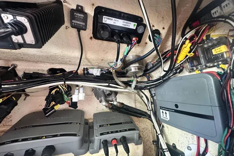 Slide: The Image of Electrical wiring and components inside a 2015 Regulator 28 Forward Seating boat. - 16