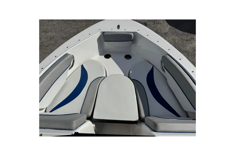 Slide: The Image of 2017 Caravelle 19 EBo Bowrider boat interior with cushioned seating and sleek design. - 3