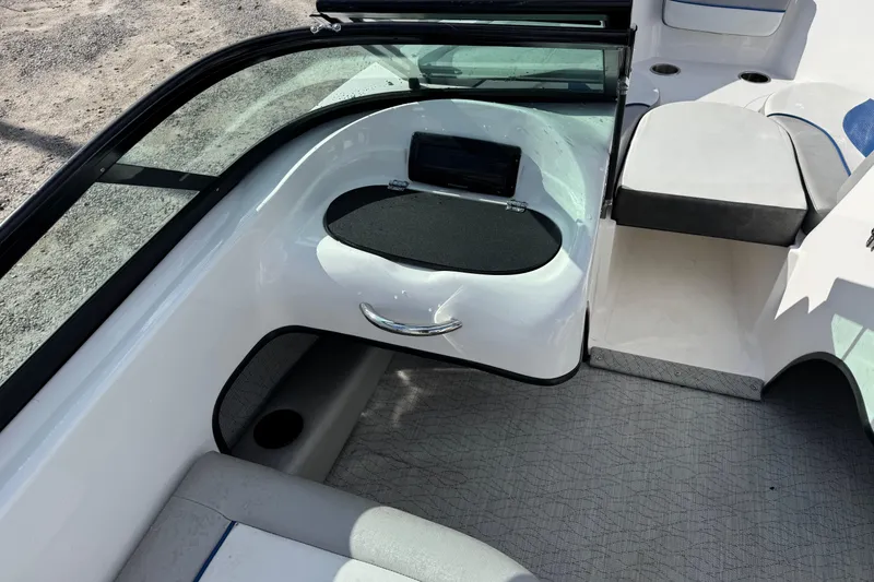 Slide: The Image of 2017 Caravelle 19 EBo Bowrider interior with seating and storage compartments. - 5