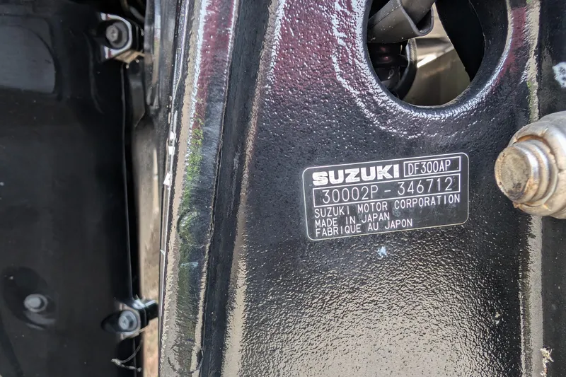 Slide: The Image of Label on Suzuki motor, model DF300AP, made in Japan, on Parker 2510 XL Walkaround boat. - 14