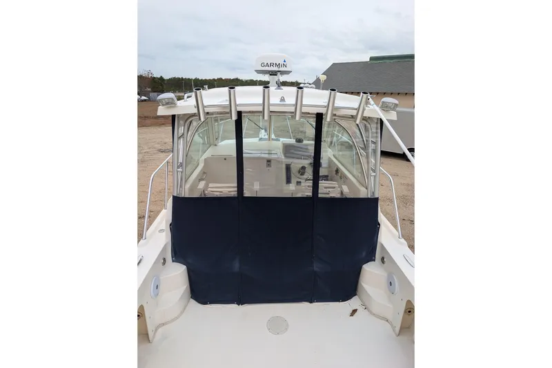 Slide: The Image of 2008 Parker 2510 XL Walkaround boat with Garmin equipment, rear view. - 7