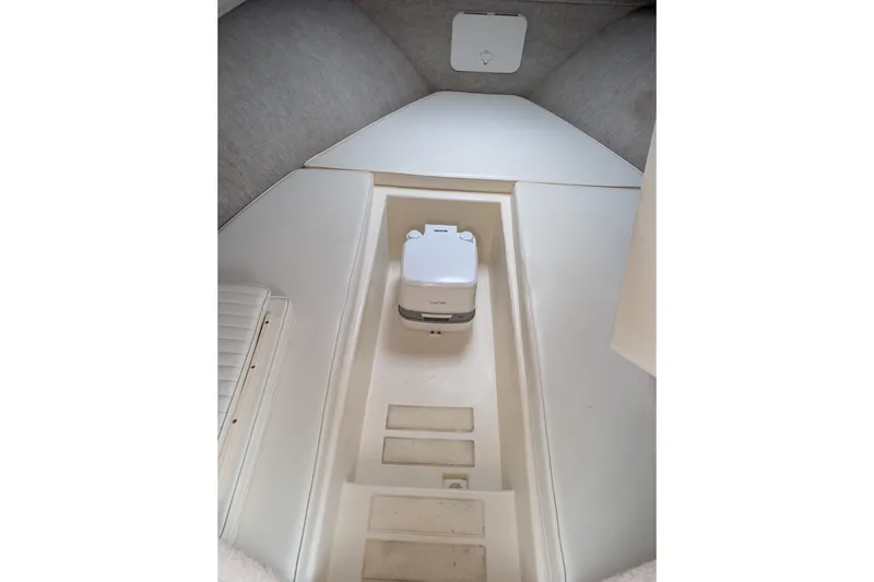 Slide: The Image of 2008 Parker 2510 XL Walkaround cabin interior with portable toilet. - 8