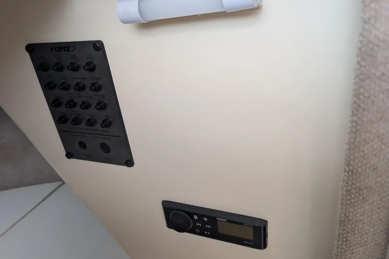 Slide: The Image of Control panel and stereo system inside a 2008 Parker 2510 XL Walkaround boat. - 9