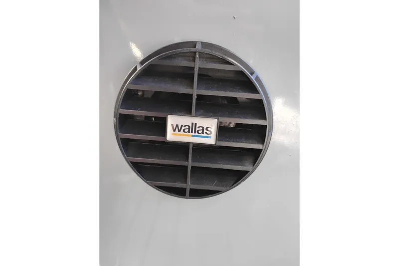 Slide: The Image of Close-up of a Valiant PT-750 2008 heater vent with Wallas branding. - 16