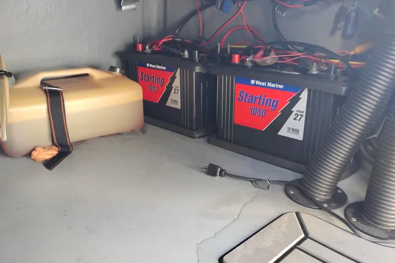 Slide: The Image of Battery compartment of a 2008 Valiant PT-750 with West Marine Starting 1050 batteries. - 18
