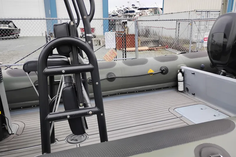 Slide: The Image of Interior view of a 2008 Valiant PT-750 boat, featuring seating and safety equipment. - 7