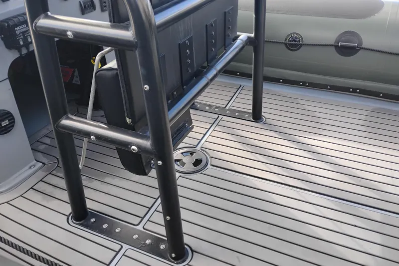 Slide: The Image of Valiant PT-750 boat interior, 2008 model, featuring sleek deck and sturdy railing. - 8