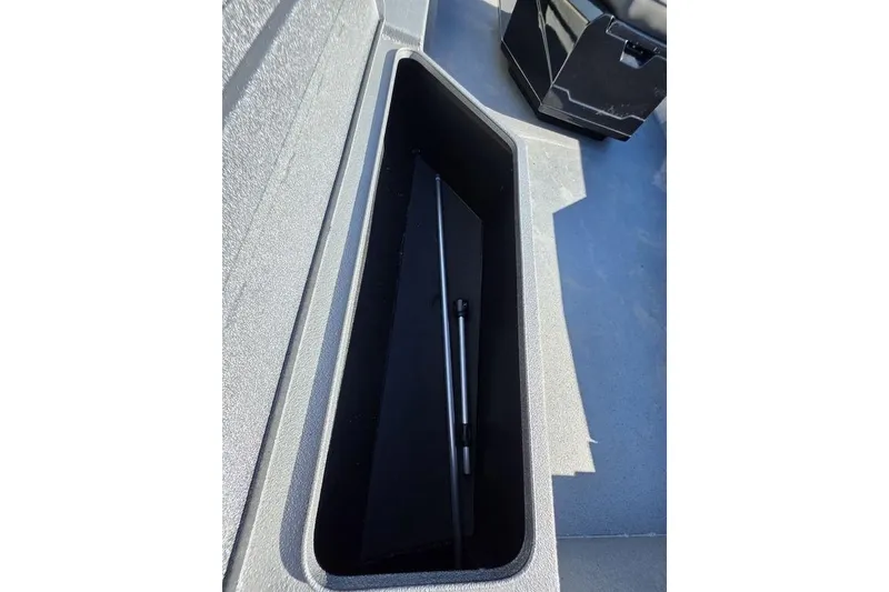 Slide: The Image of Storage compartment in 2026 Xpress H24B Bay boat, featuring sleek interior design. - 16