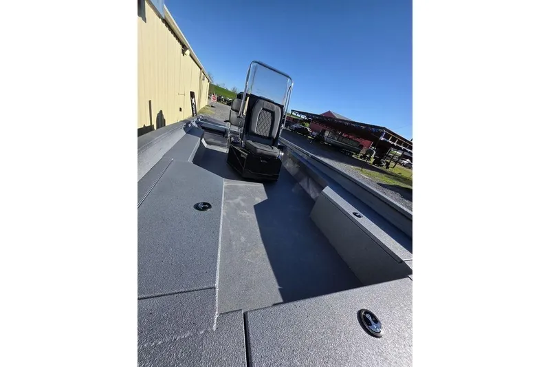 Slide: The Image of 2026 Xpress H24B Bay boat with sleek design and spacious deck. - 27